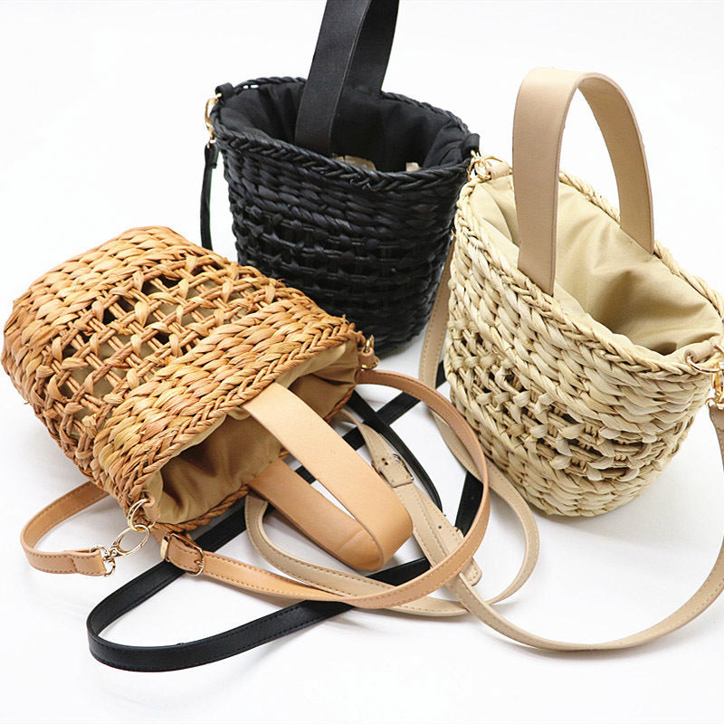 Hand-woven straw handbag