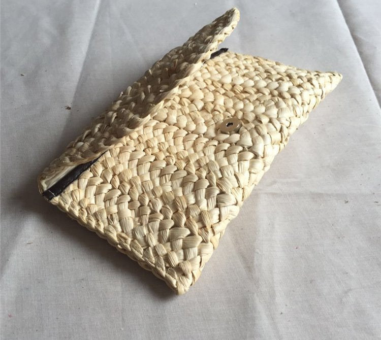 Hand-woven clutch bag