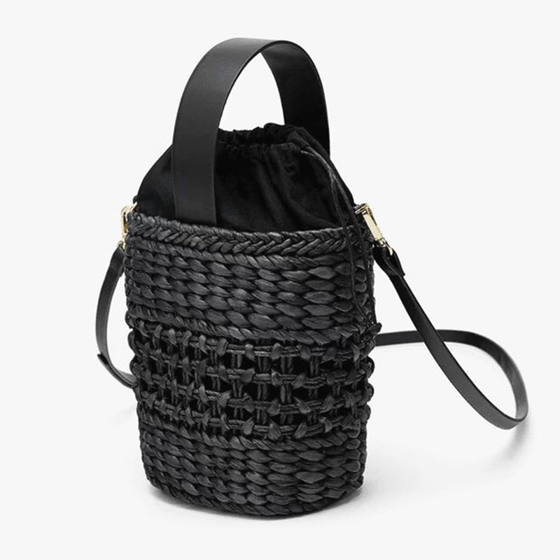 Hand-woven straw handbag