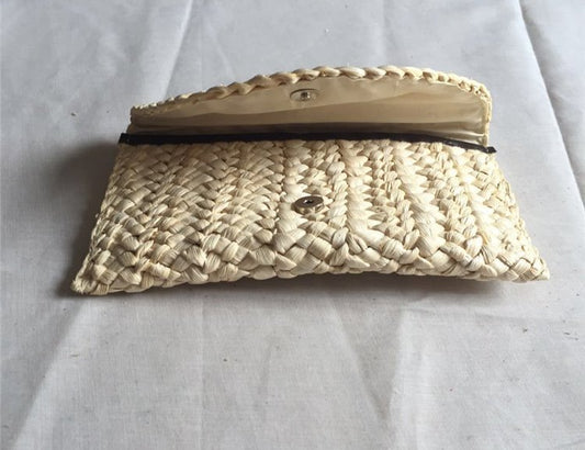 Hand-woven clutch bag