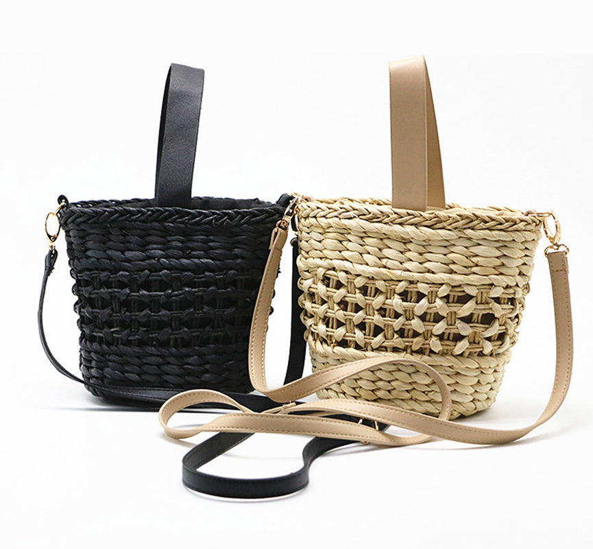 Hand-woven straw handbag